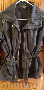 Cotton canvas light weight utility jacket.